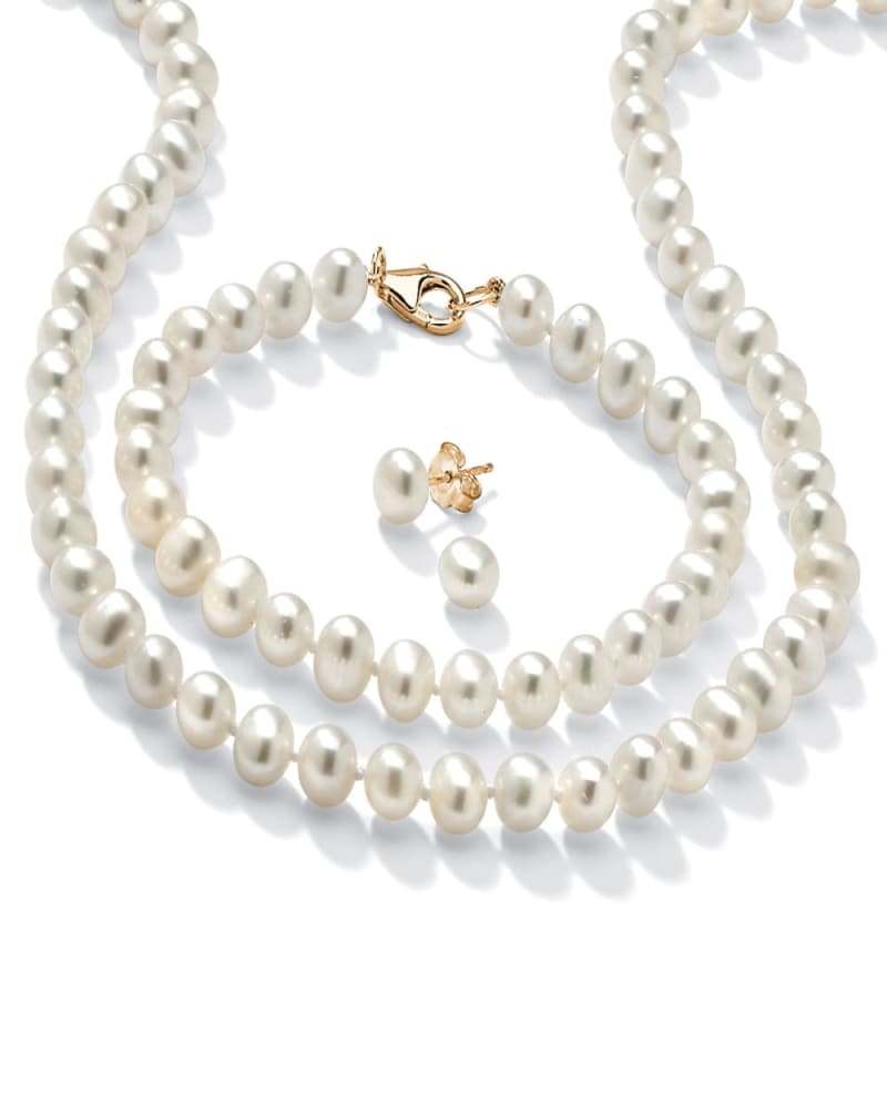 Front of a size 18 in Genuine Cultured Freshwater Pearl 3-Piece Set 14k Gold-plated Sterling Silver in White by PalmBeach Jewelry. | dia_product_style_image_id:297178